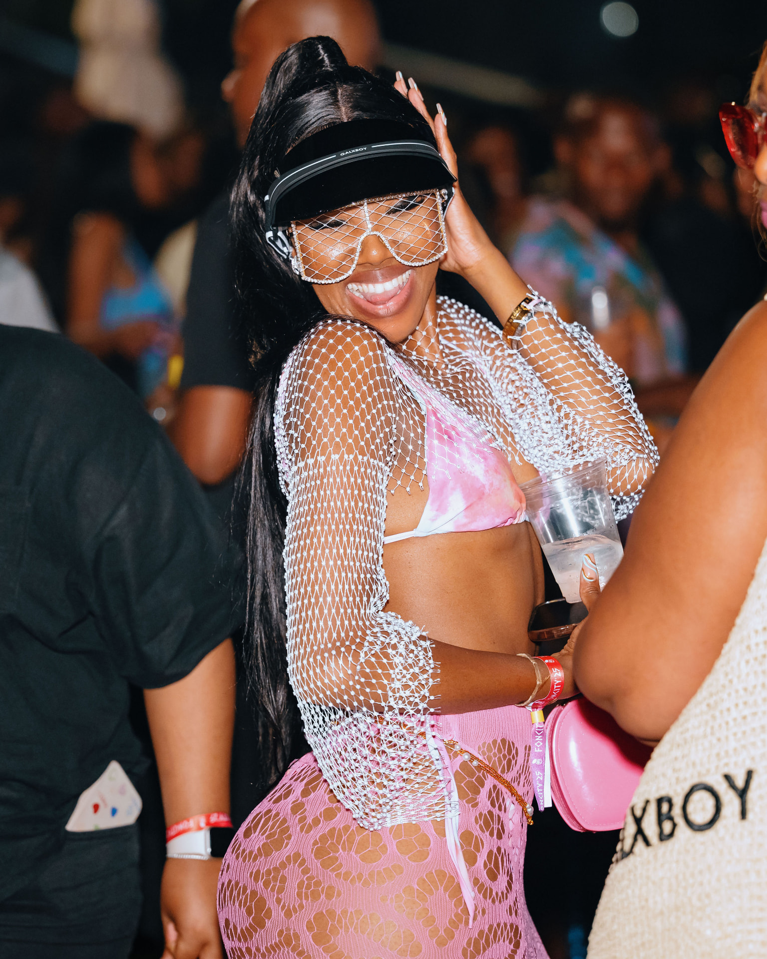 Guest in a sparkling outfit at the night party